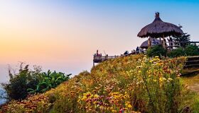 Misty Mae Taeng valley at dawn for a scenic Mae Taeng Tours banner by Legend Travel Group.